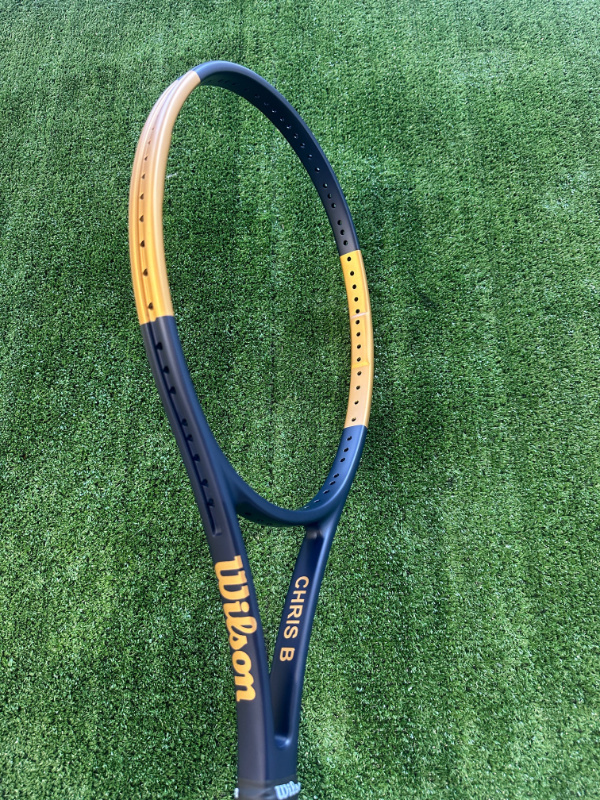 Custom painted tennis racket metallic blue gold