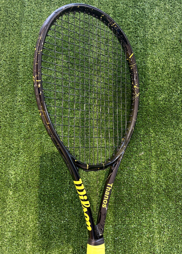 Custom painted racket black yellow splash